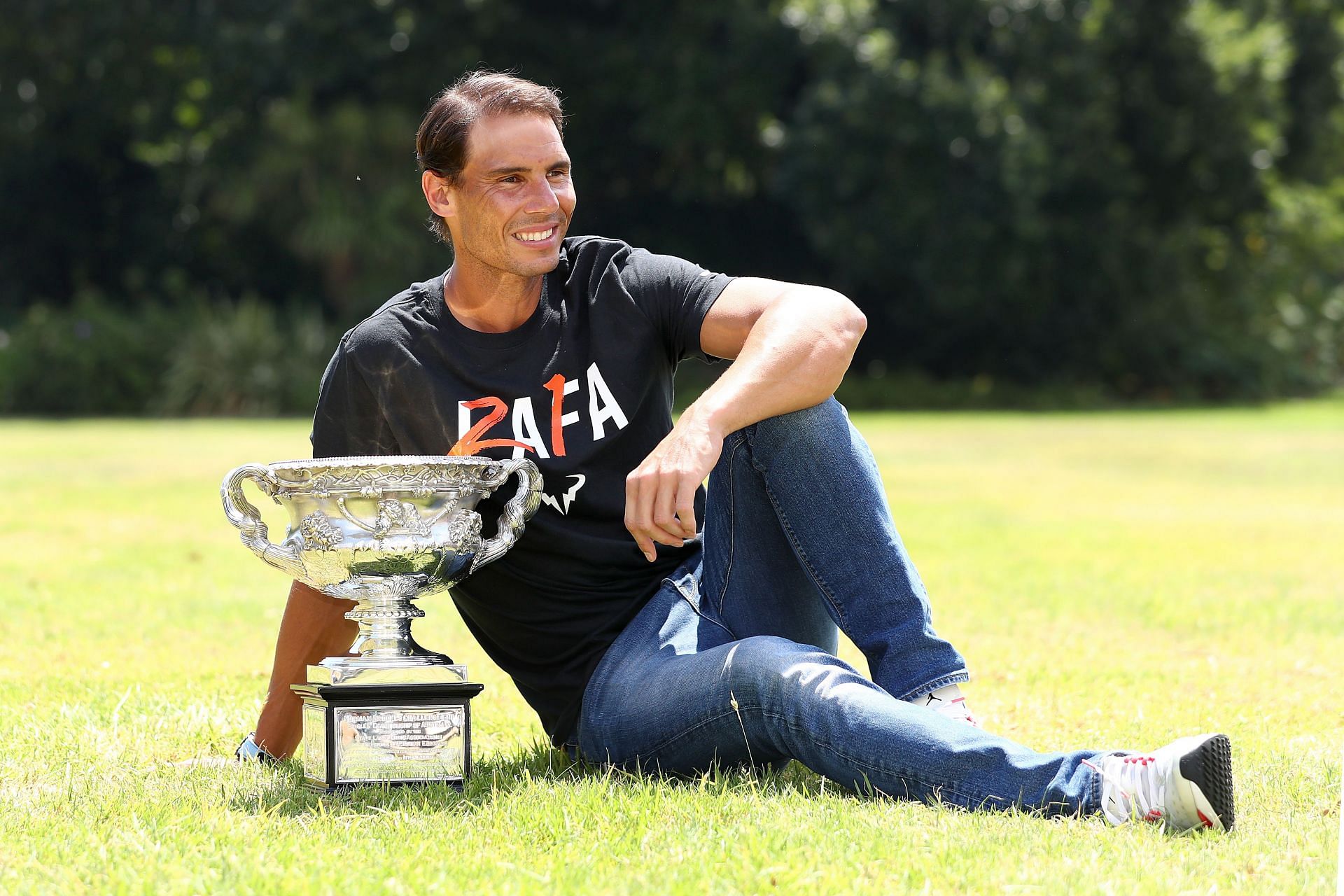 The Spanish bull poses with the 2022 Australian Open trophy