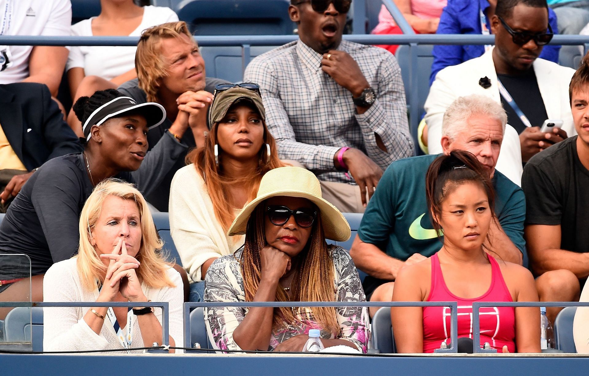 Venus Williams and mother Oracene Price at the 2014 US Open.