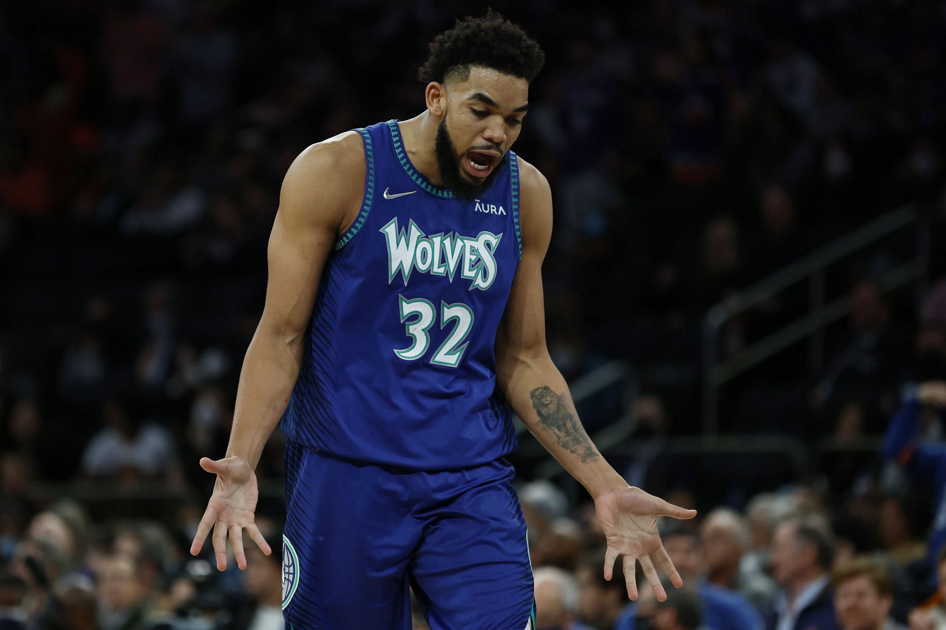 Karl-Anthony Towns reacts to a play.