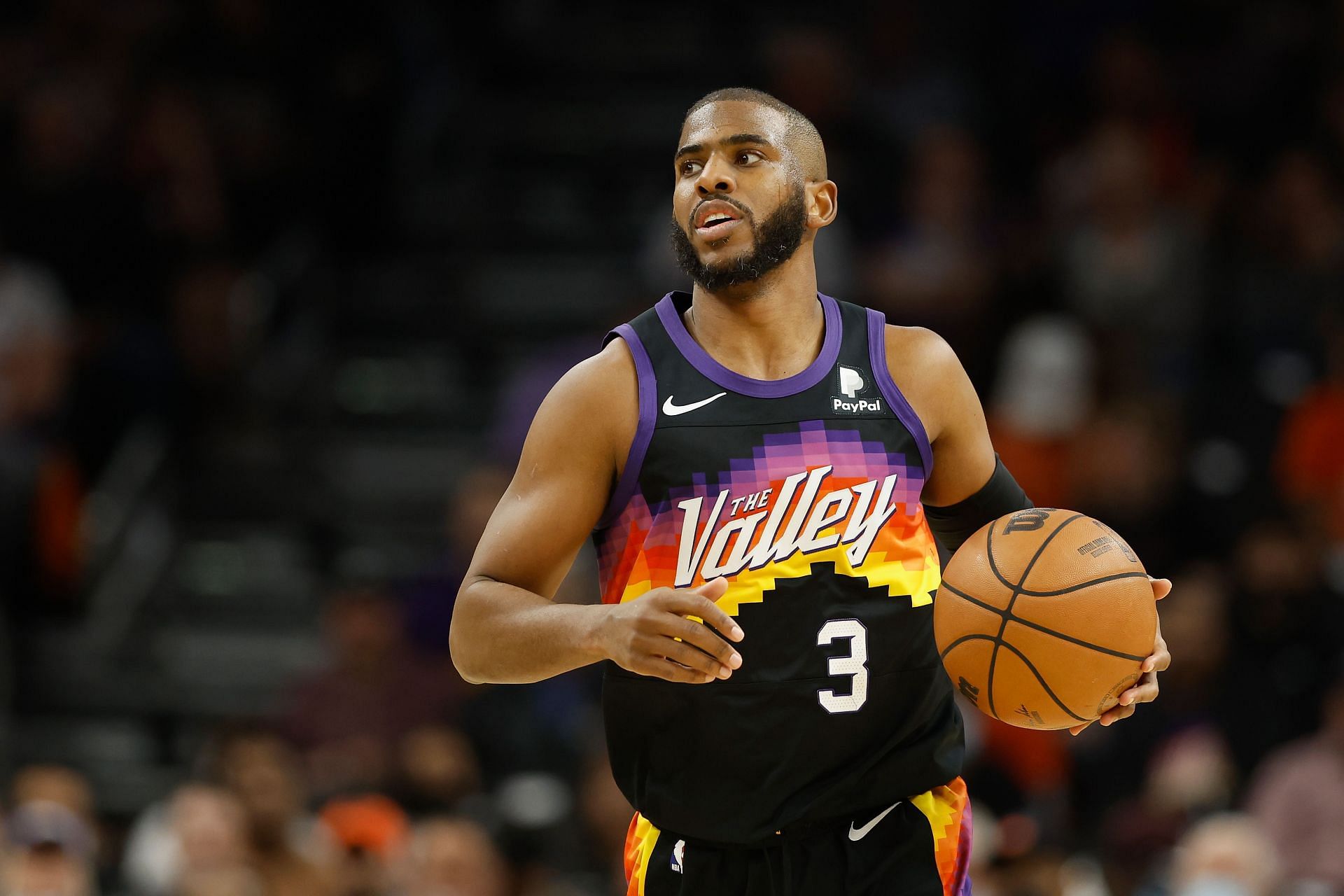 Chris Paul scans the floor to make a play.