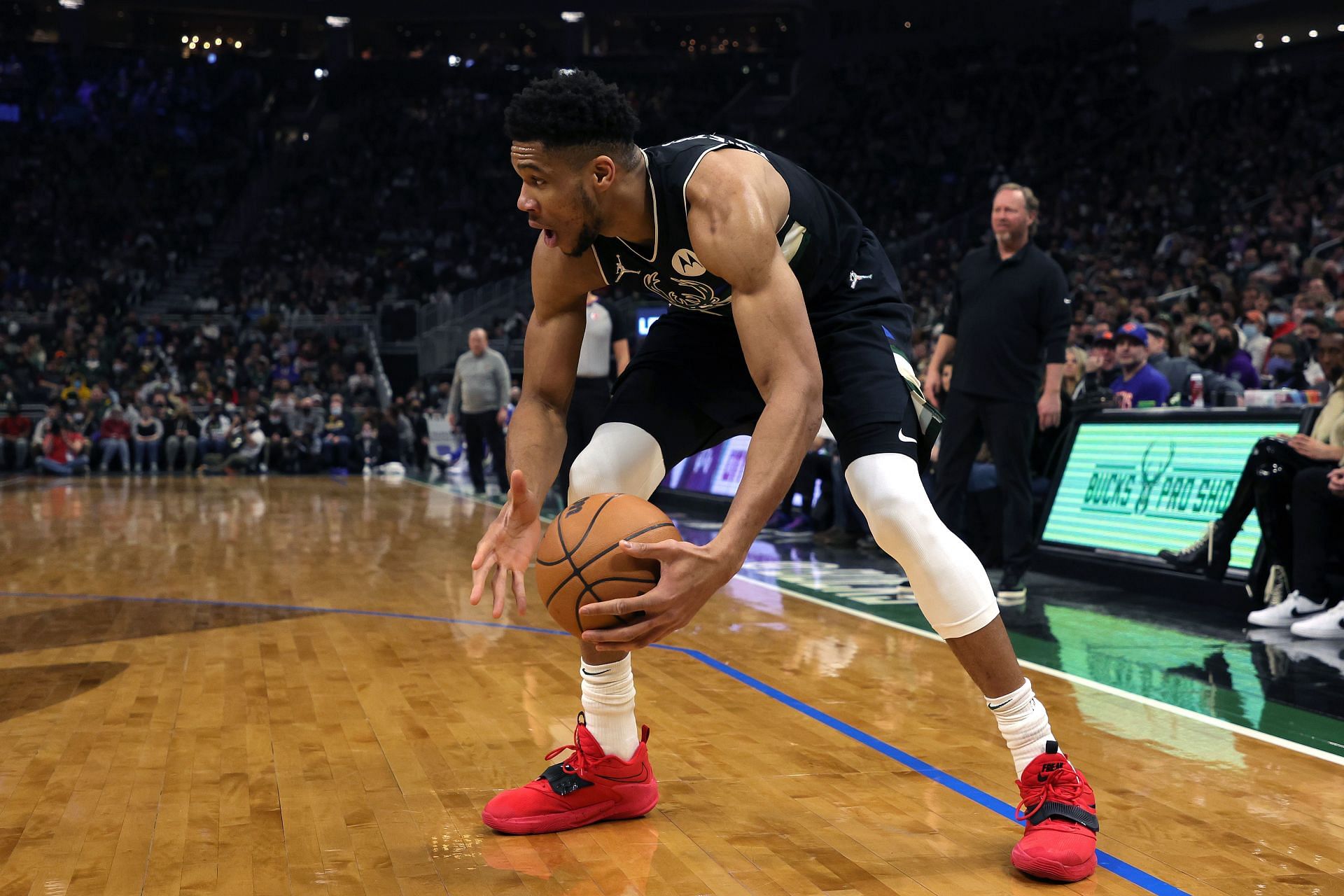 Giannis Antetokounmpo #34 of the Milwaukee Bucks handles the ball against the New York Knicks during the second quarter at Fiserv Forum on January 28, 2022 in Milwaukee, Wisconsin.