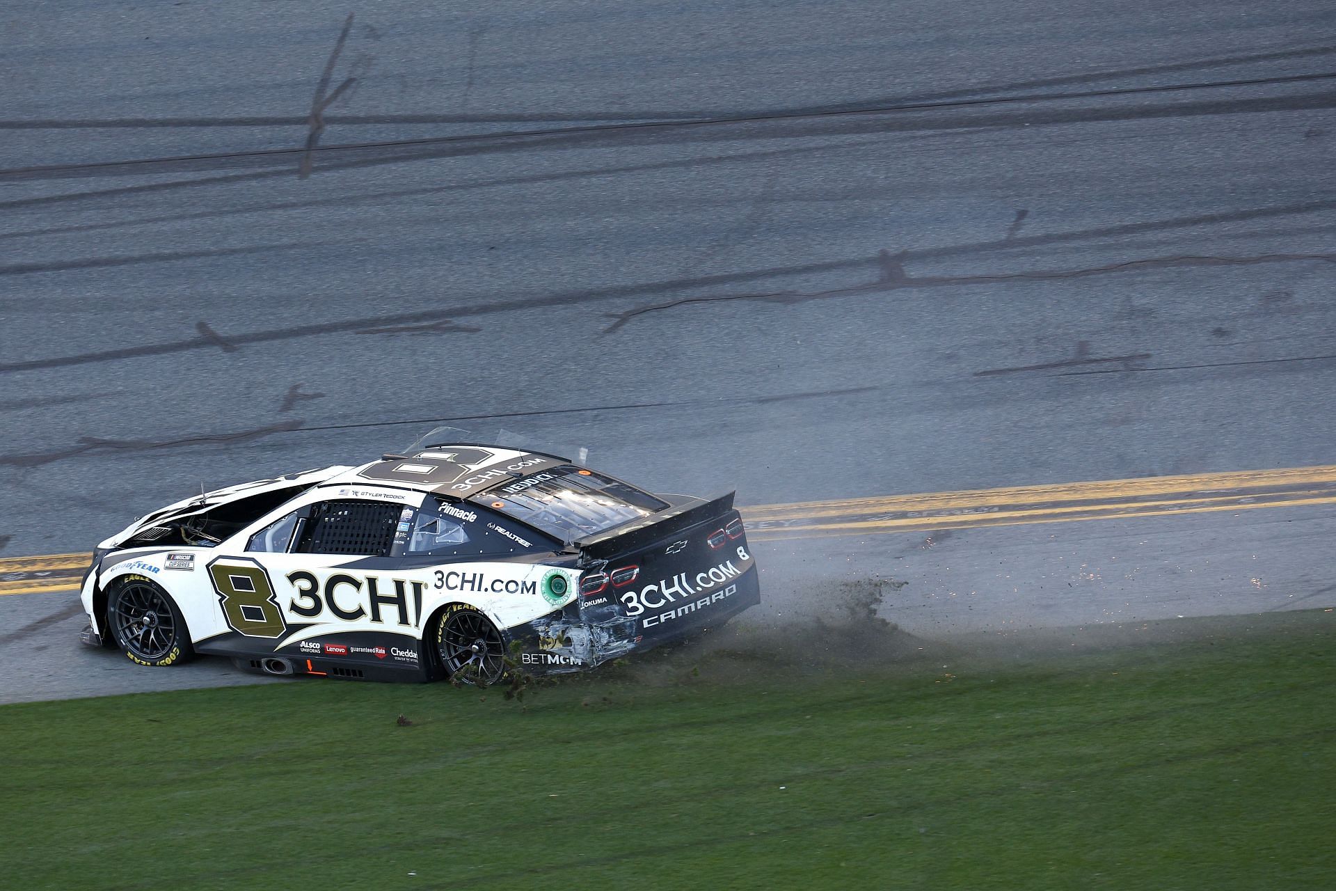Tyler Reddick&#039;s car spins onto infield grass after the on-track incident at the 64th annual Daytona 500