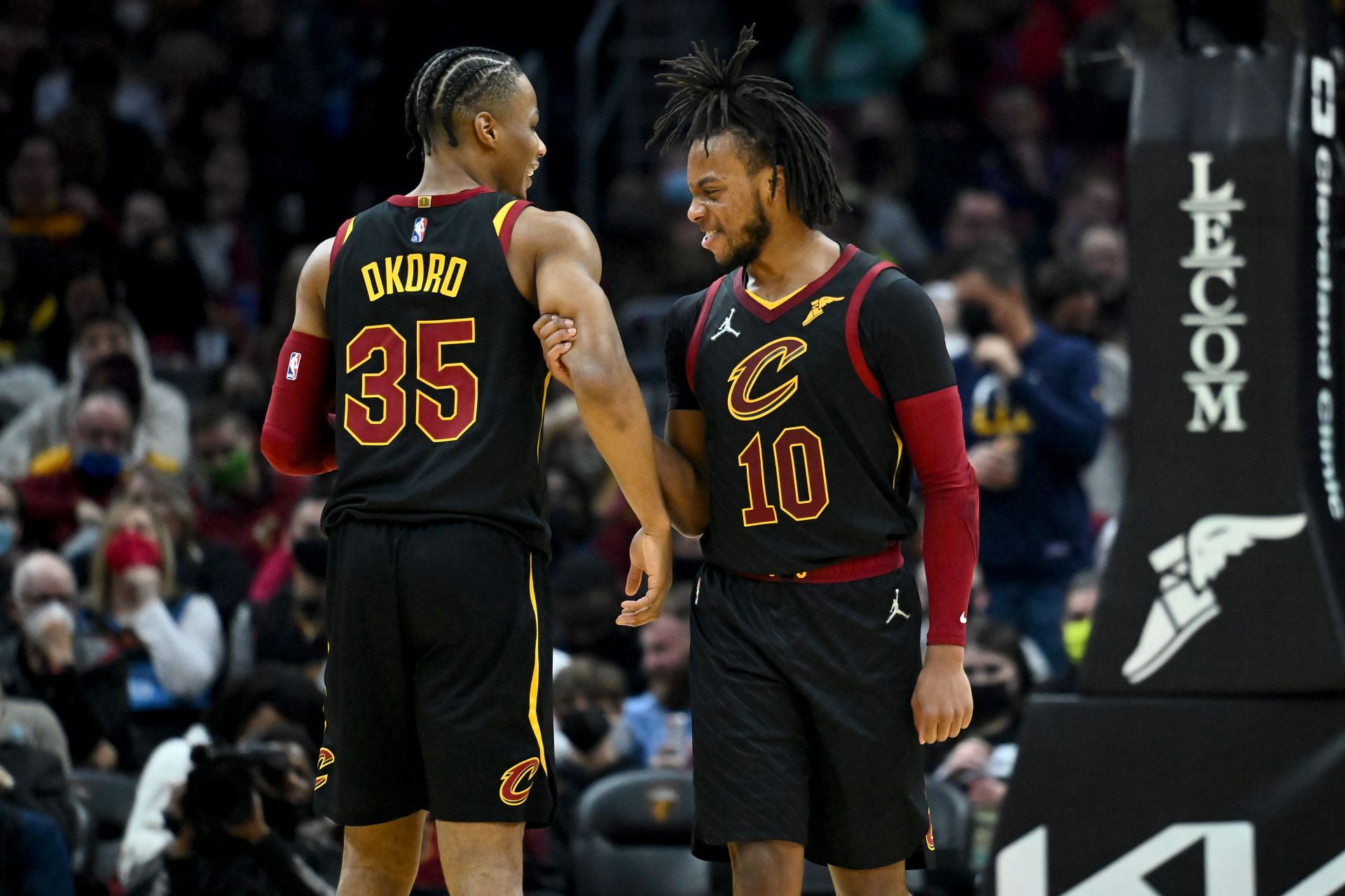 Isaac Okoro and Darius Garland (10) of the Cleveland Cavaliers celebrate after Okoro scored against the OKC Thunder at Rocket Mortgage Fieldhouse on Jan. 22 in Cleveland, Ohio.