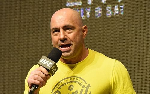 UFC commentator Joe Rogan [center]