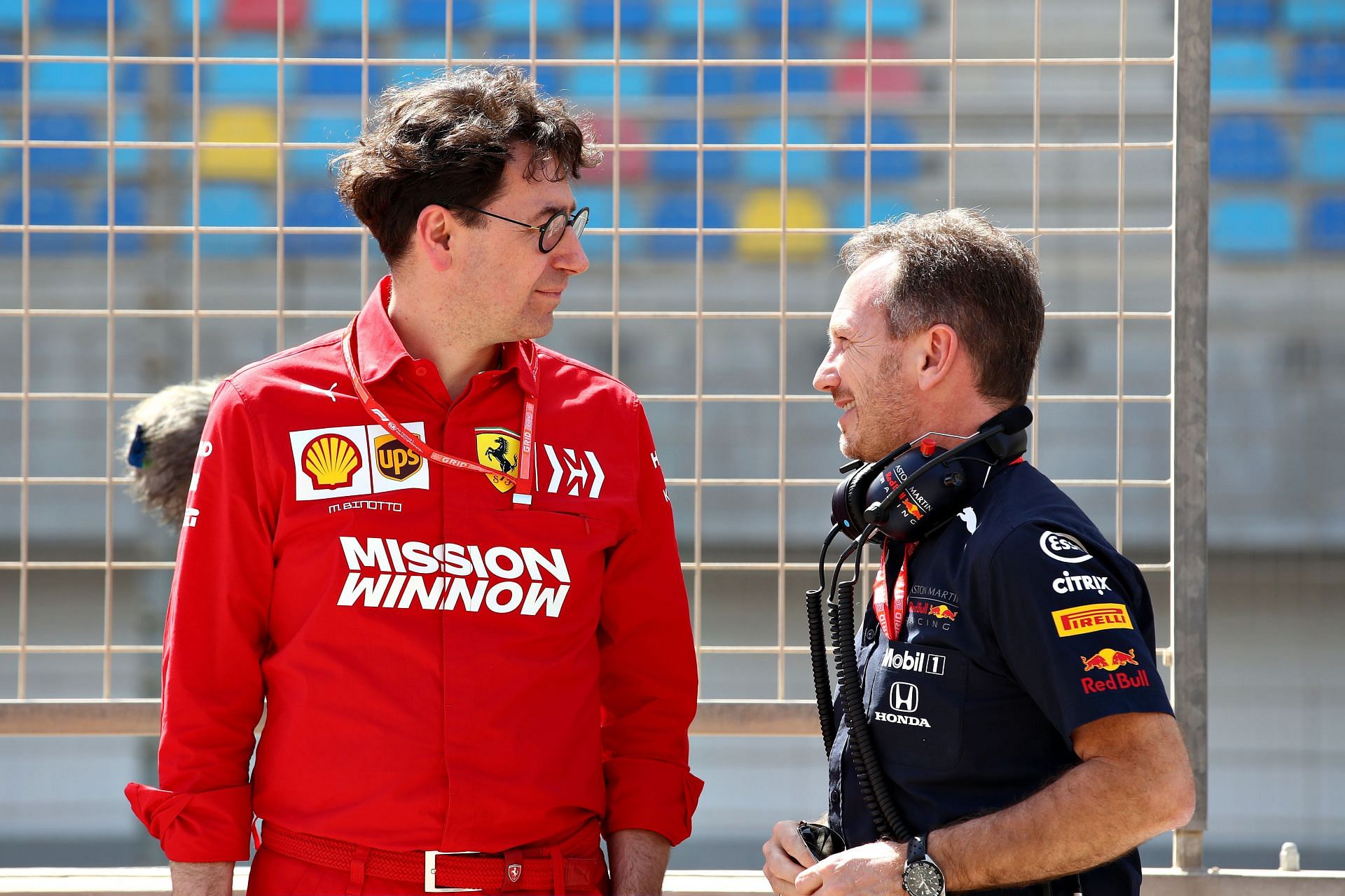 Red Bull team principal Christian Horner speaks with Ferrari team principal Mattia Binotto ahead of the 2019 Bahrain Grand Prix