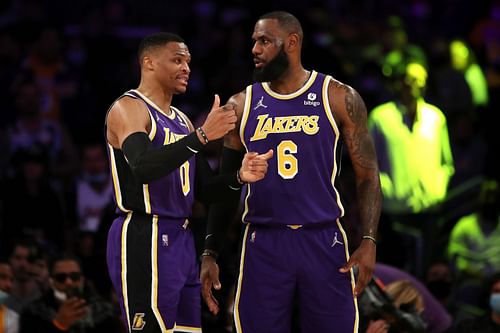 Enter caption Russell Westbrook #0 and LeBron James #6 of the LA Lakers discuss a play during the first quarter against the Utah Jazz at Crypto.com Arena on February 16, 2022 in Los Angeles, California