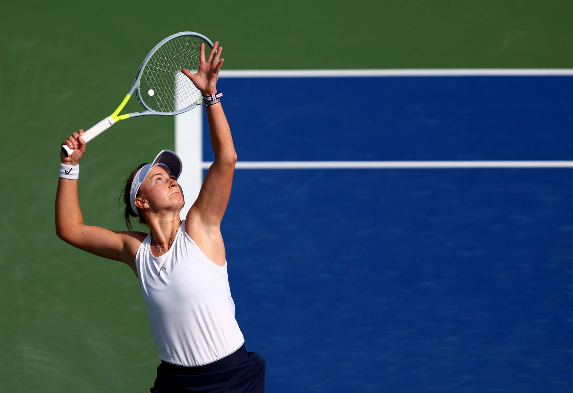 Barbora Krejcikova serves during her first-round match in Dubai