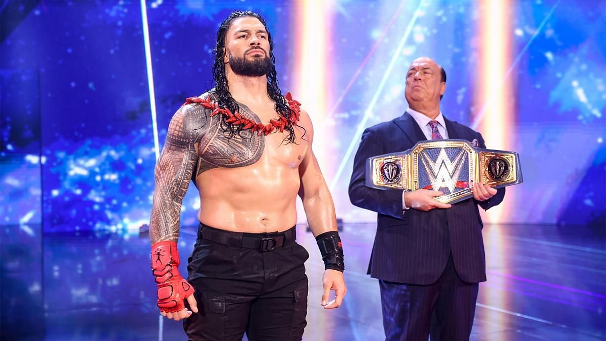 Roman Reigns stands tall with Paul Heyman