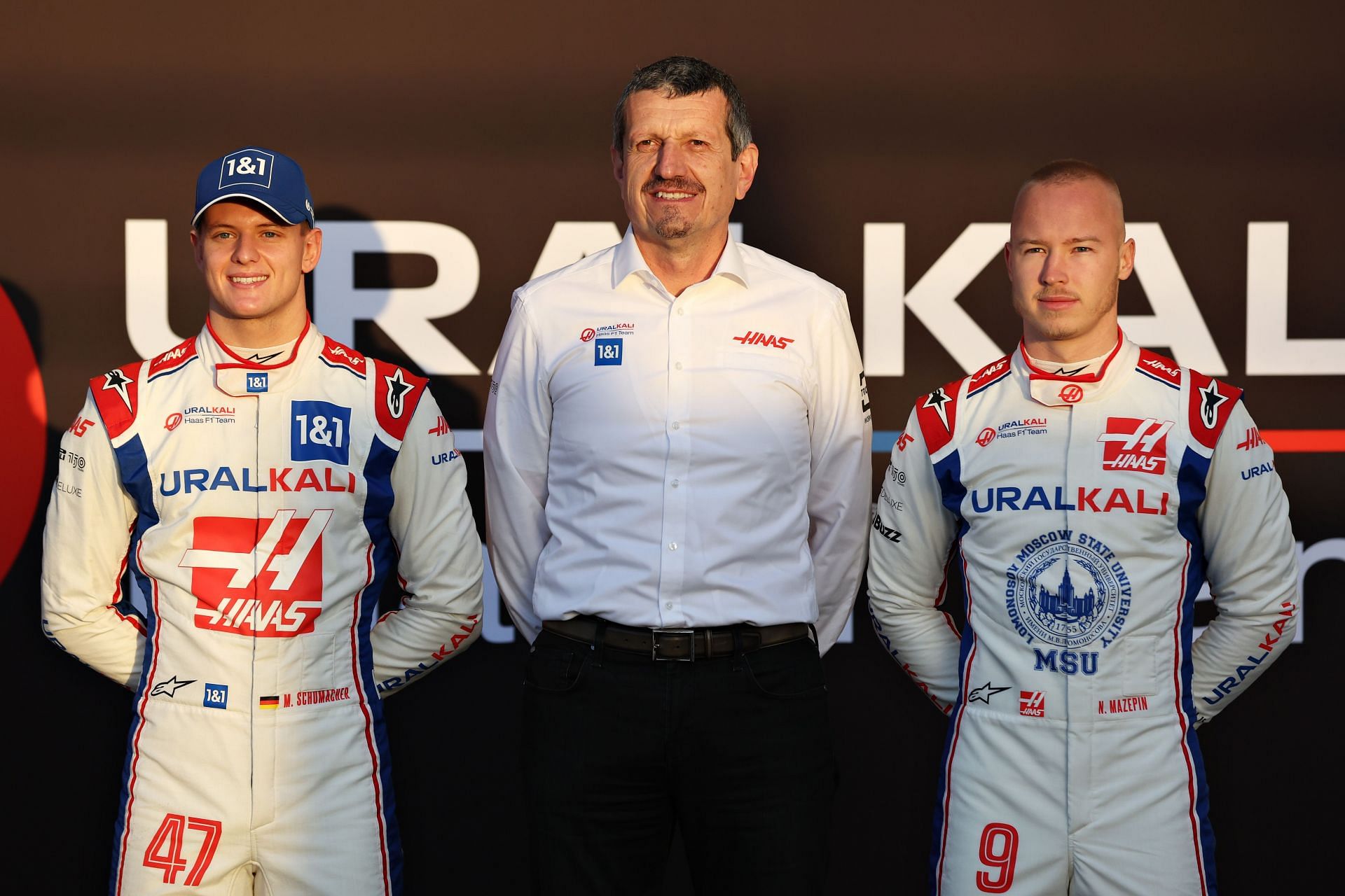 Nikita Mazepin, Haas F1 Team Principal Guenther Steiner and Mick Schumacher (Photo by Mark Thompson/Getty Images)