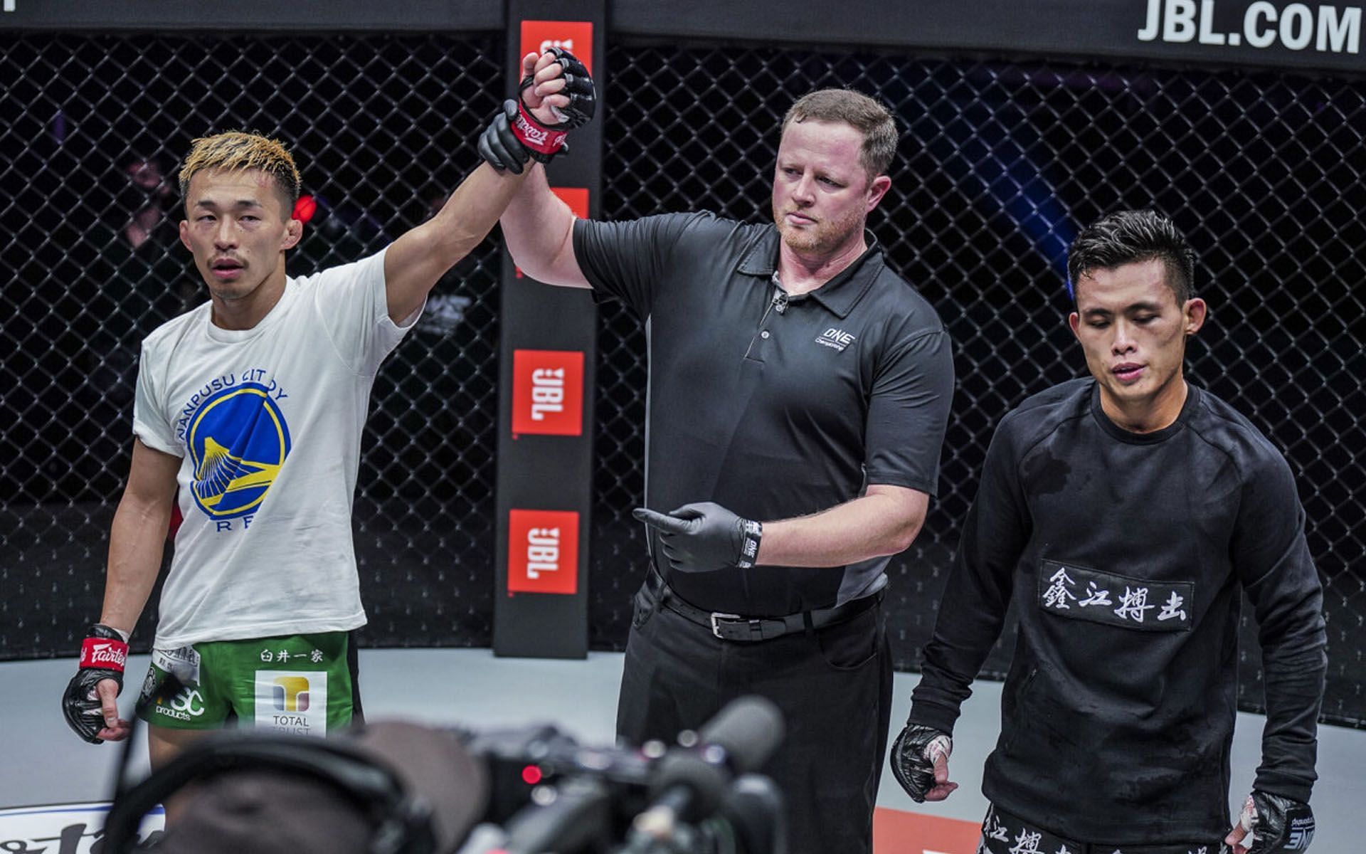 Tatsumitsu Wada (Left) got his hand raised against Wang Shuo at ONE: Only the Brave. | [Photo: ONE Championship]