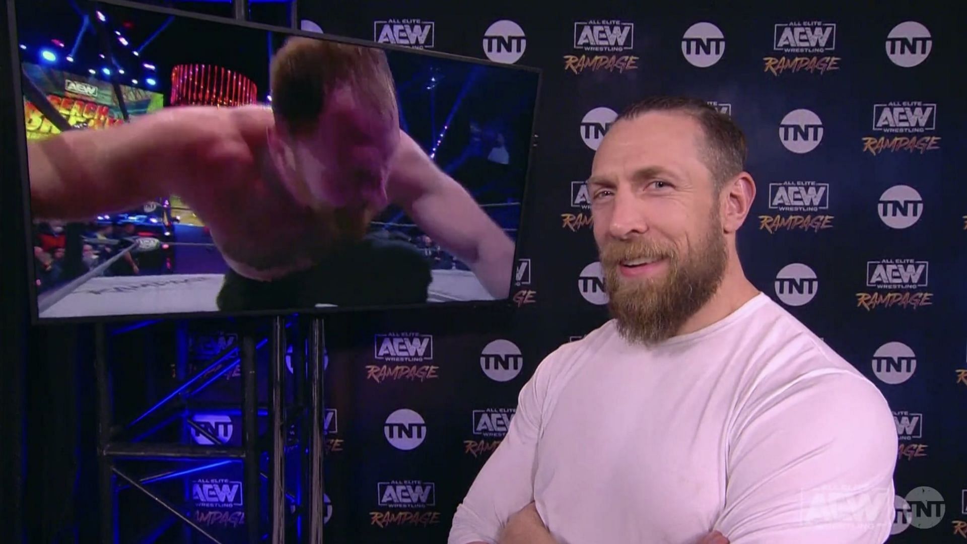 Bryan Danielson is backstage watching Jon Moxley perform on AEW Rampage.