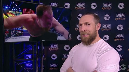 Bryan Danielson is backstage watching Jon Moxley perform on AEW Rampage.