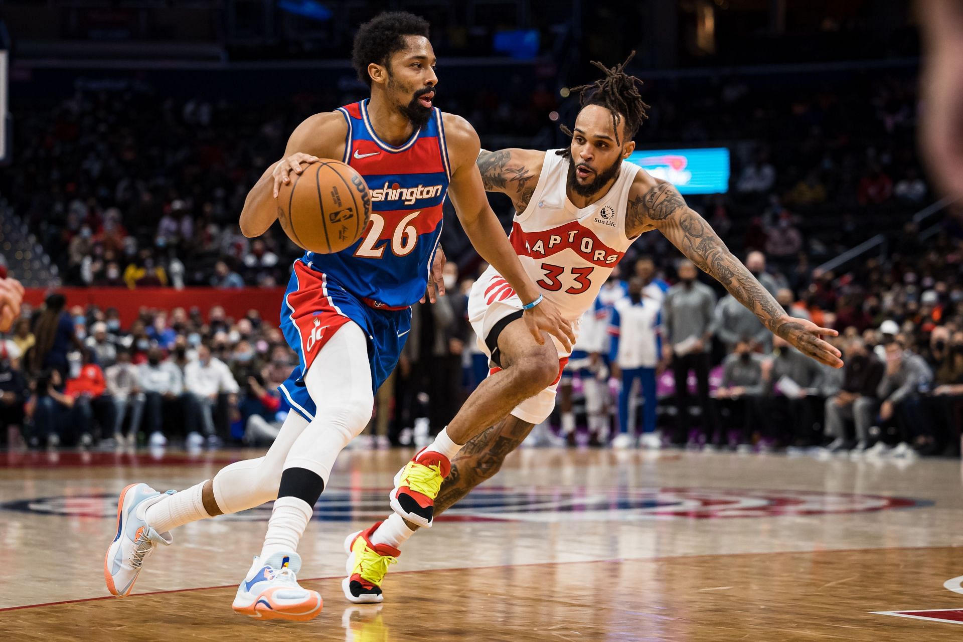 Spencer Dinwiddie attempts to dribble past Gary Trent Jr.