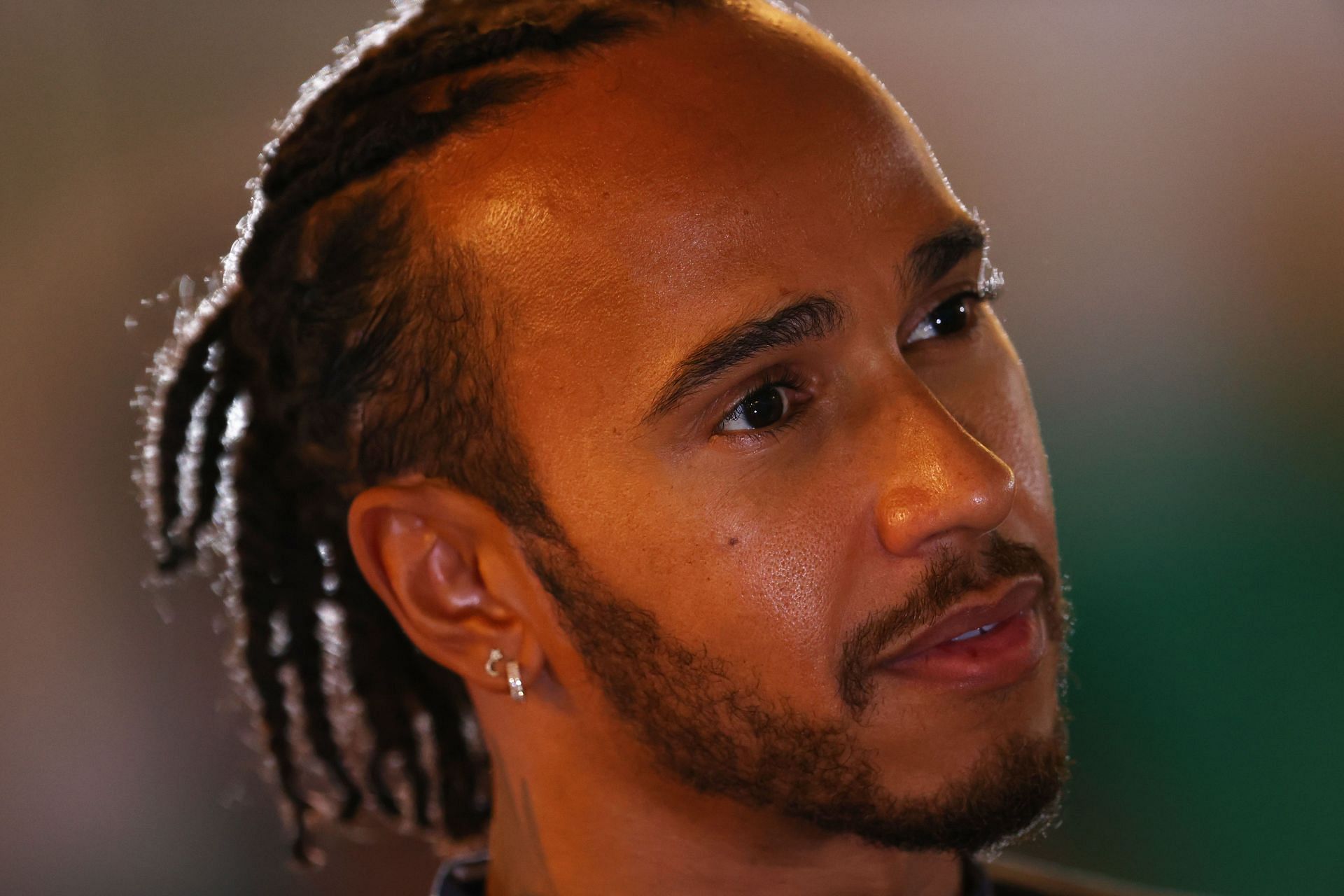 Lewis Hamilton in the F1 paddock at the Yas Marina circuit in Abu Dhabi. (Photo by Clive Rose/Getty Images)