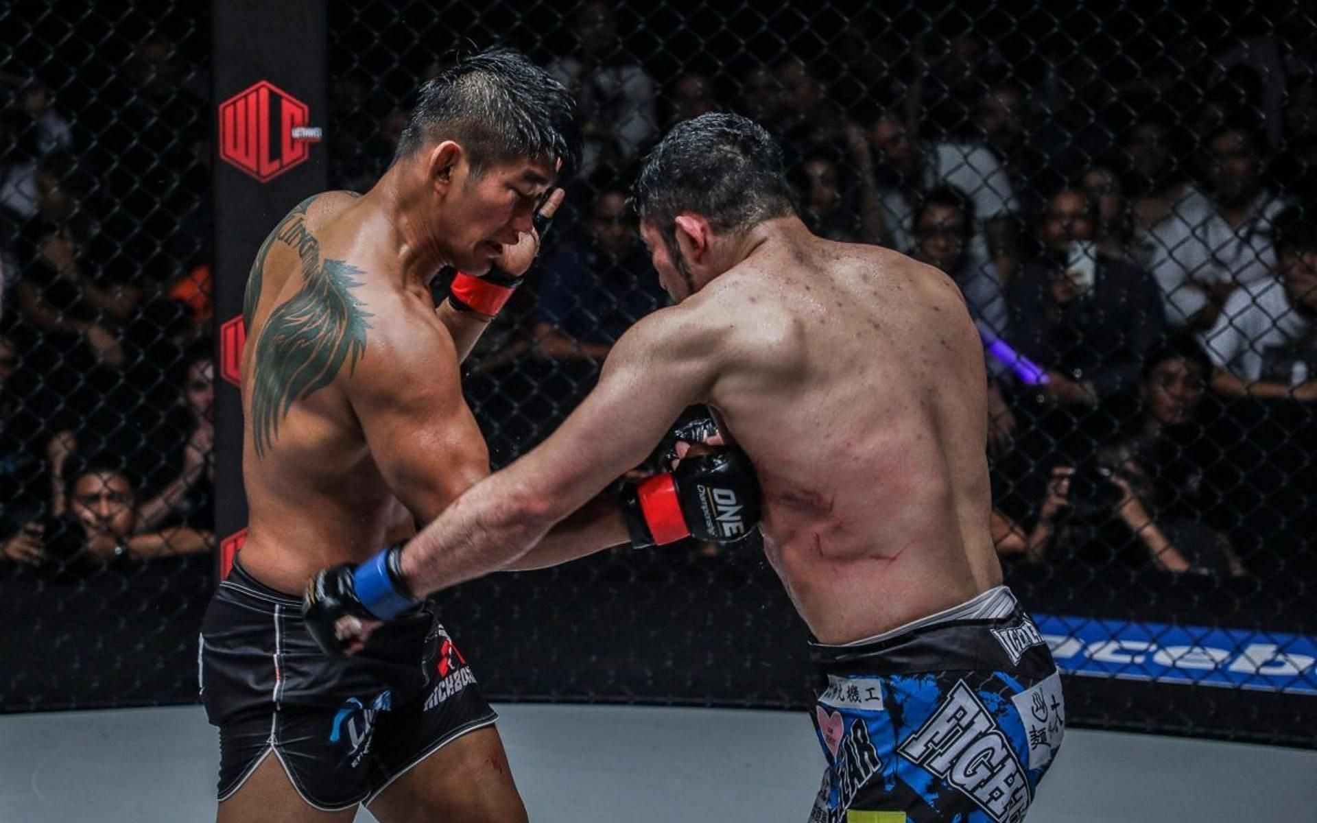 Former ONE Championship middleweight champion Aung La N Sang (left) took part in one of the greatest fights the sport has ever seen against Ken Hasegawa (right) [Image courtesy of ONE Championship]