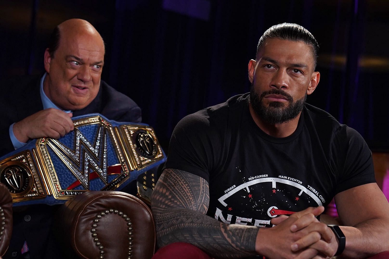 Roman Reigns with his Special Council Paul Heyman.