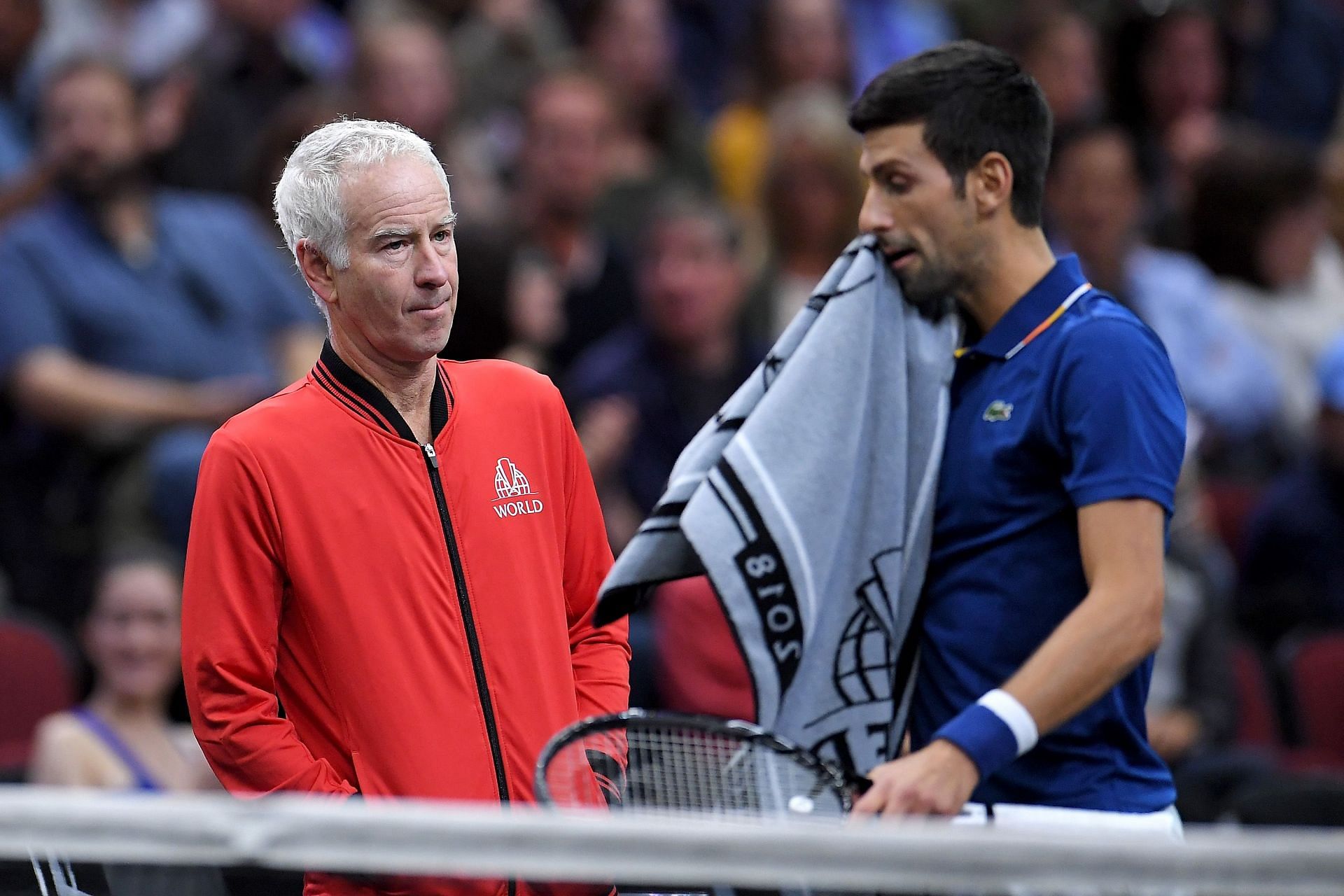 John McEnroe looks on as Novak Djokovic plays a match at the 2018 Laver Cup