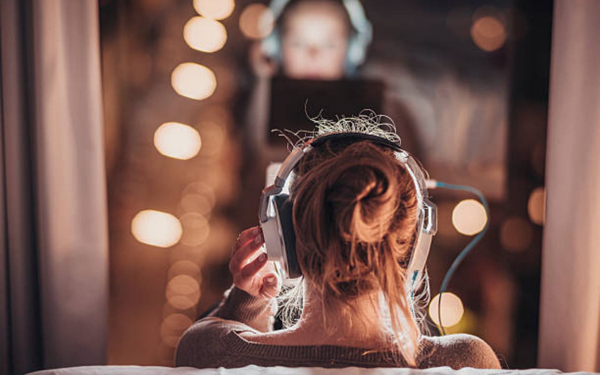 Listening to a particular song until all interest is lost (Image via Getty Images)