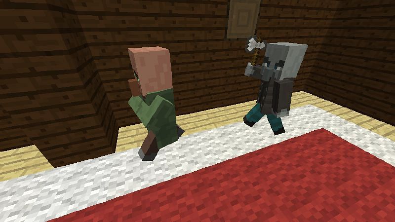 Vindicator chasing a villager (Image via Minecraft Wiki)