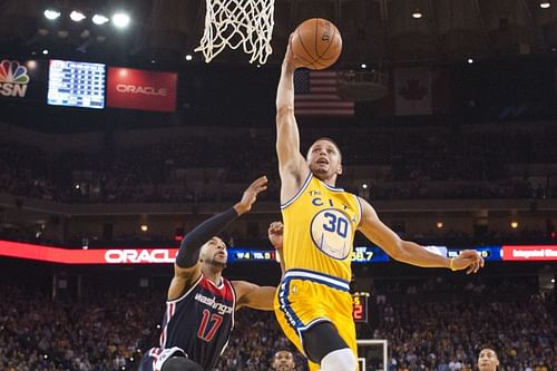 Steph Curry dunking the basketball. (Photo: Courtesy of USA Today)