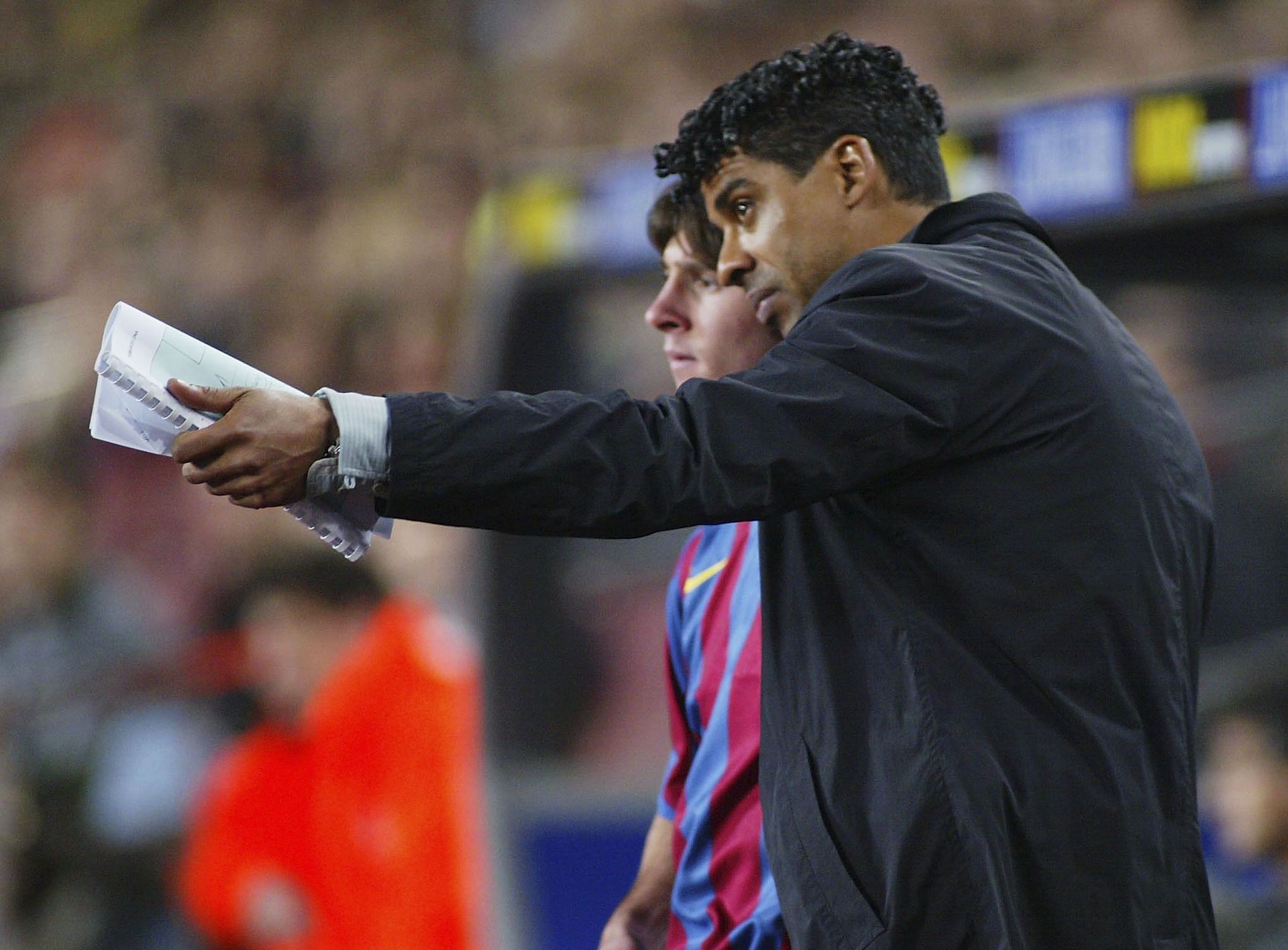 Frank Rijkaard (right) managed Messi in over 100 games.