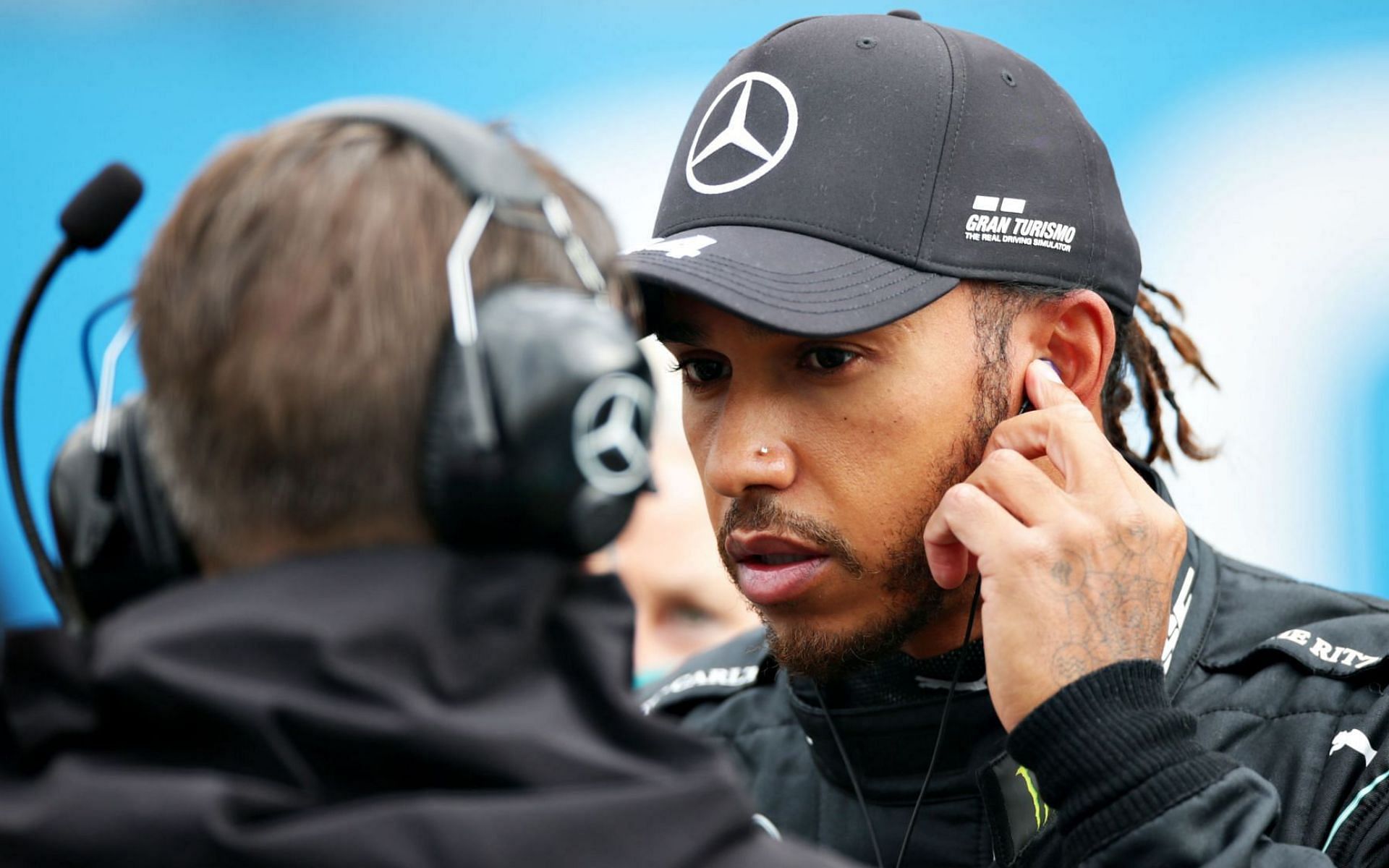 Lewis Hamilton interacts with his race engineer Peter Bonnington ahead of the 2021 San Marino Grand Prix