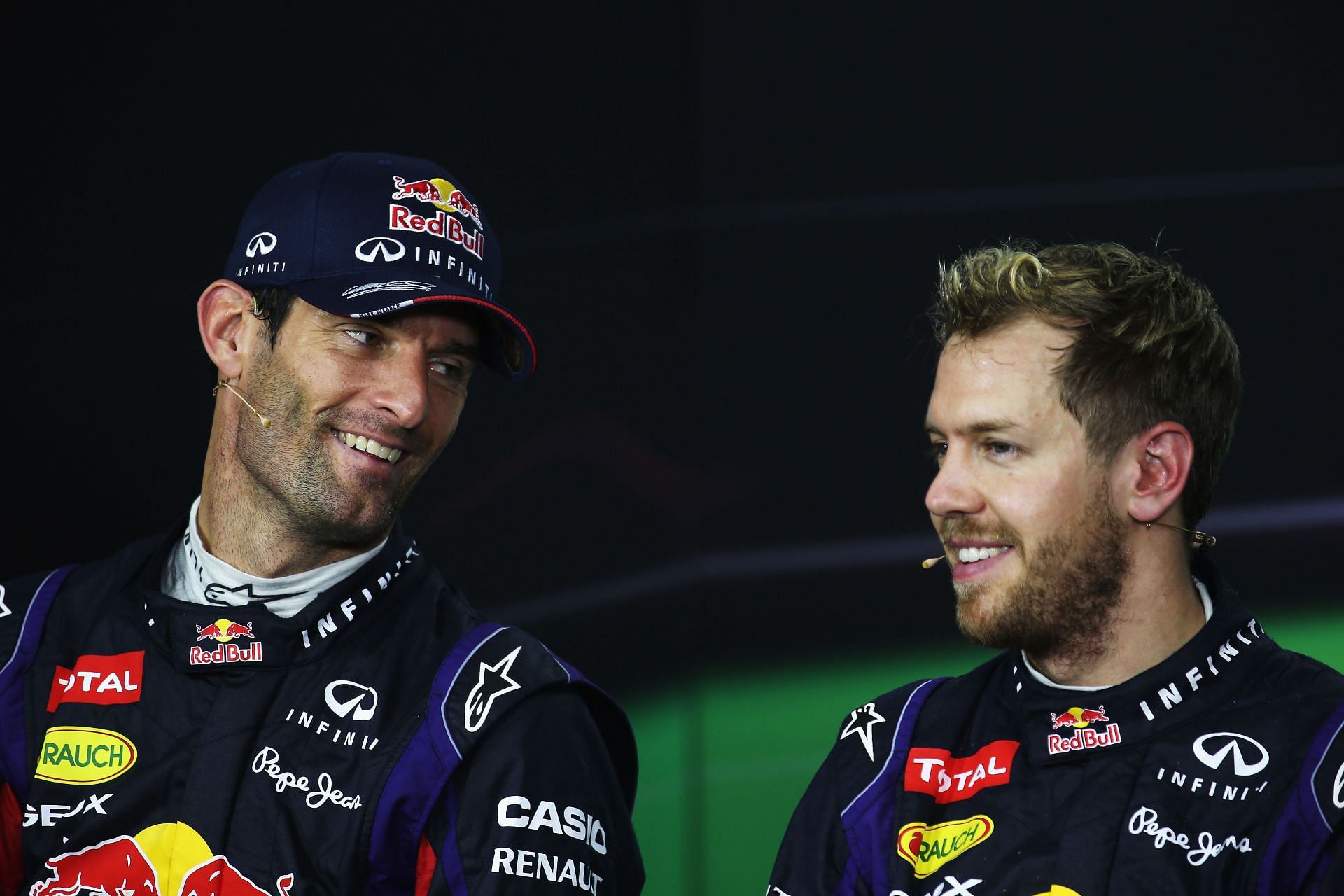Sebastian Vettel (right) and Mark Webber (left) in Brazil 2013 (Photo by Mark Thompson/Getty Images)