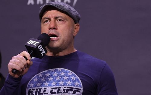 UFC veteran color commentator Joe Rogan [center]