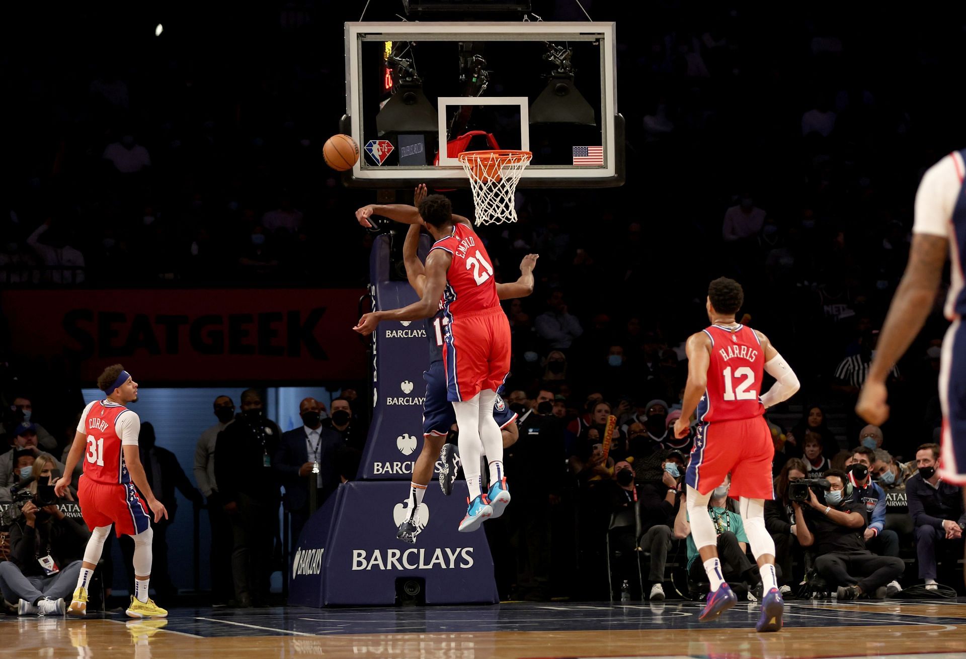 Joel Embiid of the Philadelphia 76ers blocks a layup by James Harden of the Brooklyn Nets on Dec. 30 in New York City.