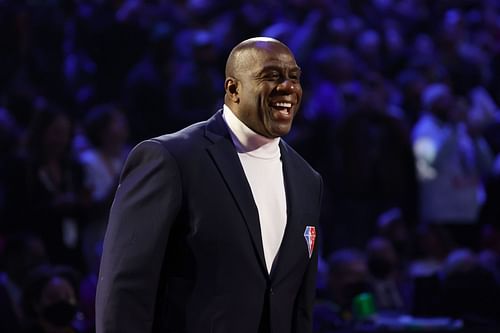 Earvin "Magic" Johnson reacts after being introduced as part of the NBA's 75th Anniversary Team at the All-Star Game on Sunday.