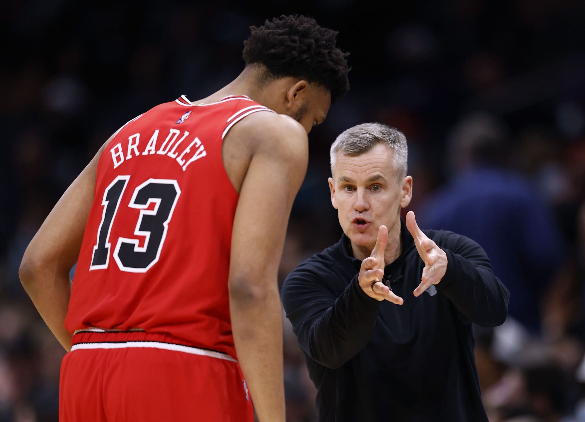 Coach Billy Donovan talks with Tony Bradley of the Chicago Bulls.