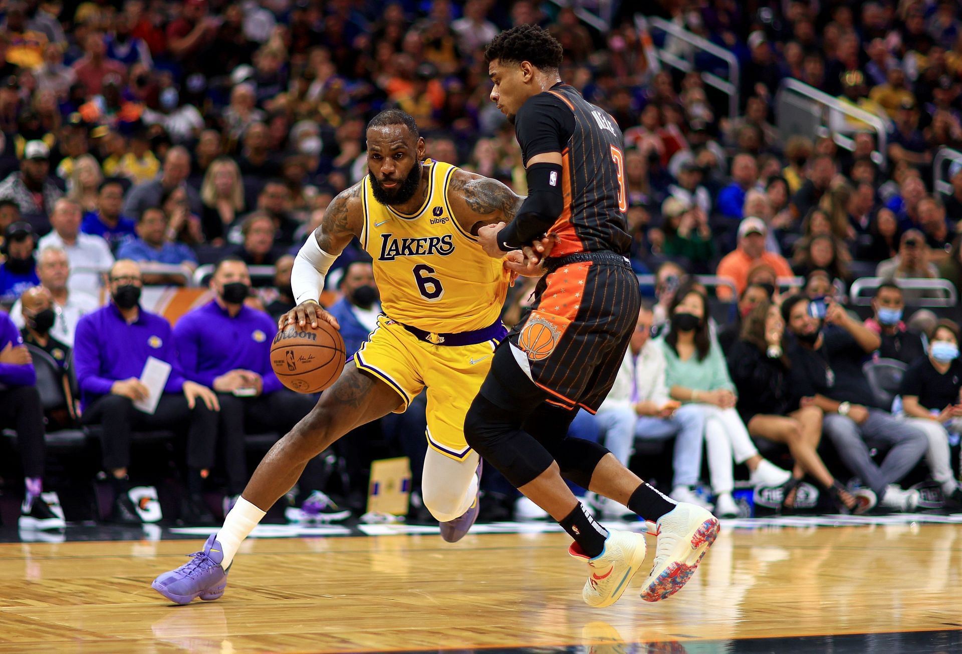 LeBron James of the LA Lakers drives to the basket during a game against the Orlando Magic.