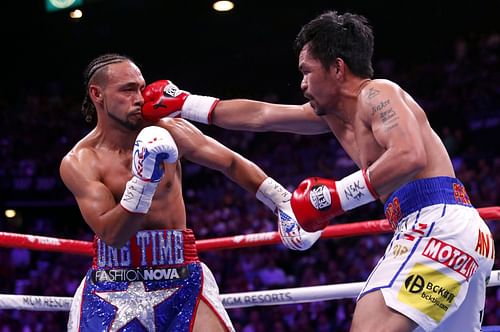 Keith Thurman (L) has given his assessment of his 2019 loss to Manny Pacquiao (R)