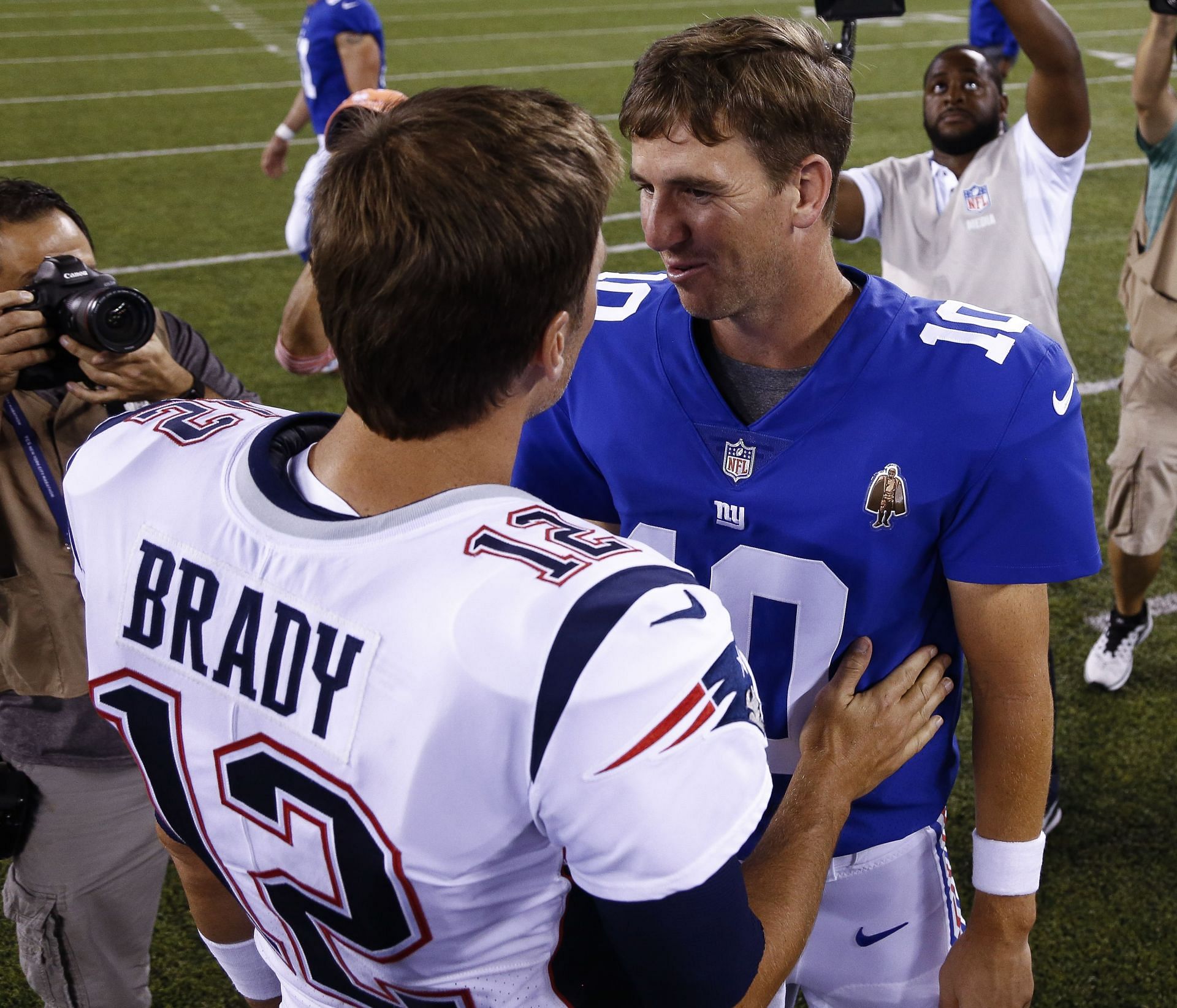 Former New England Patriots QB Tom Brady and former New York Giants QB Eli Manning