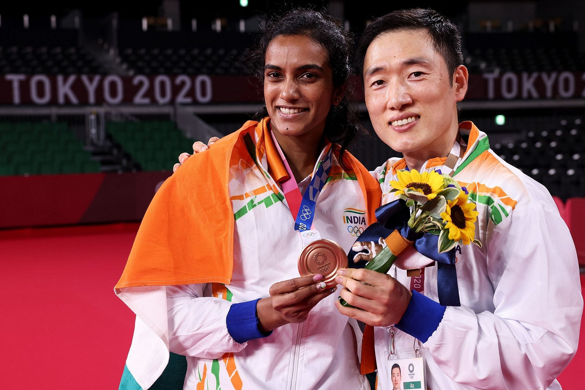 PV Sindhu with her coach Park Tae-sang after winning the 2020 Tokyo Olympic bronze medal
