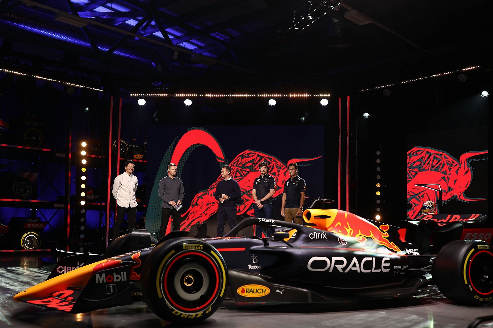 The RB18 during its launch with Max Verstappen (second from right) in the background (Photo by Bryn Lennon/Getty Images)