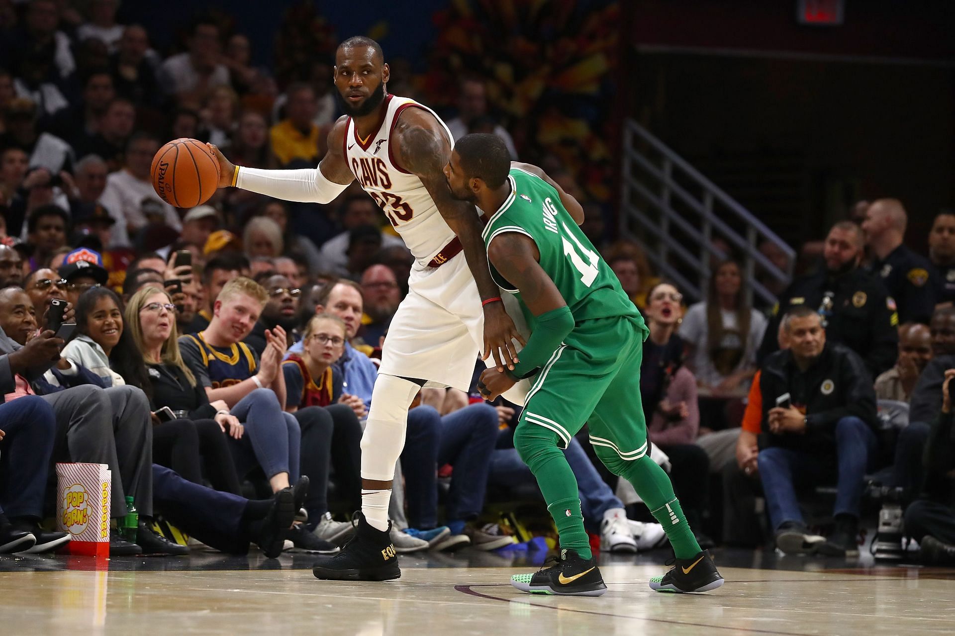 LeBron James being guarded by Kyrie Irving