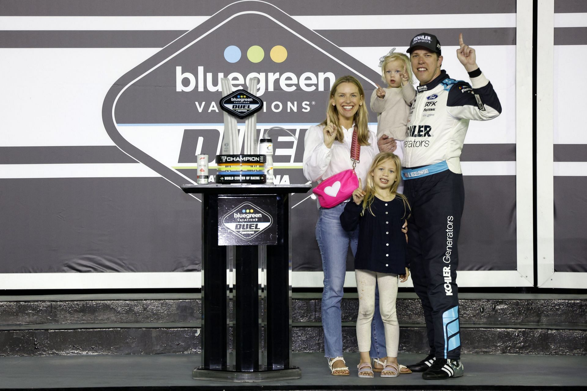 Brad Keselowski celebrates with his family on securing pole at the NASCAR Cup Series Bluegreen Vacations Duel #1 at Daytona (Photo by Chris Graythen/Getty Images)