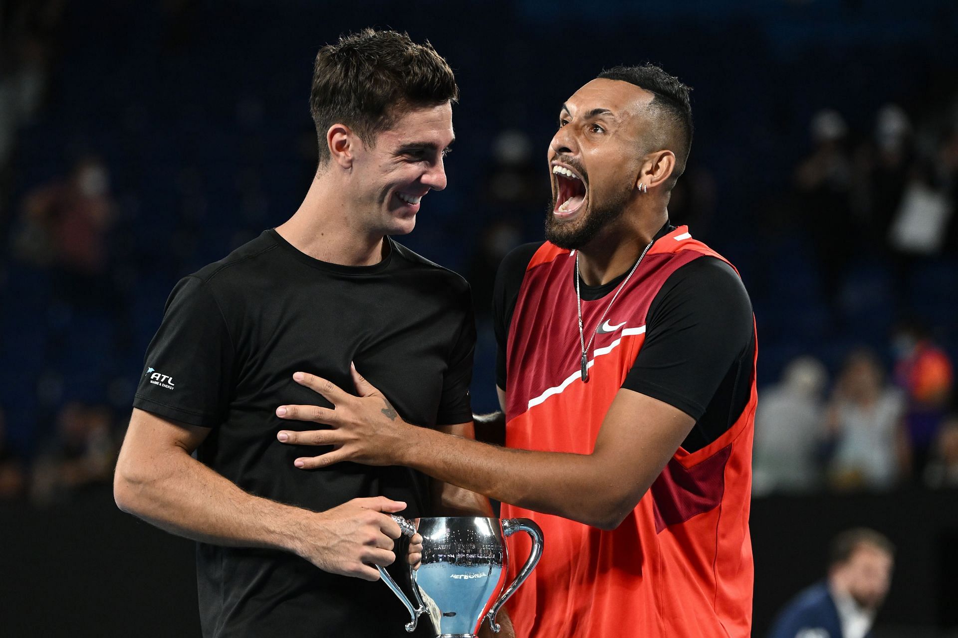 Thanasi Kokkinakis and Nick Kyrgios with the 2022 Australian Open doubles title