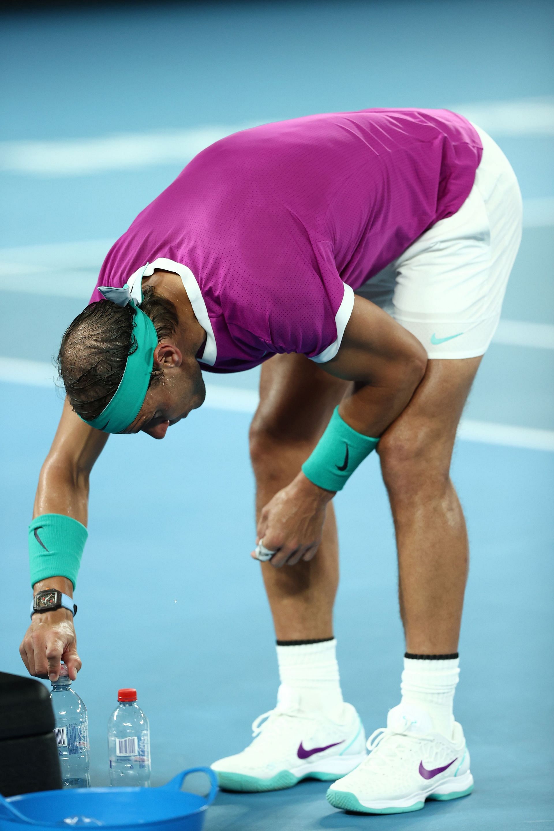 Rafael Nadal adjustung his bottles during his Australian Open 2022 campaign