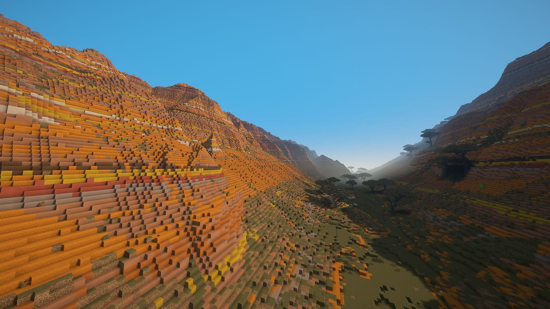 Another shot of the mesa valley (Image via Minecraft)