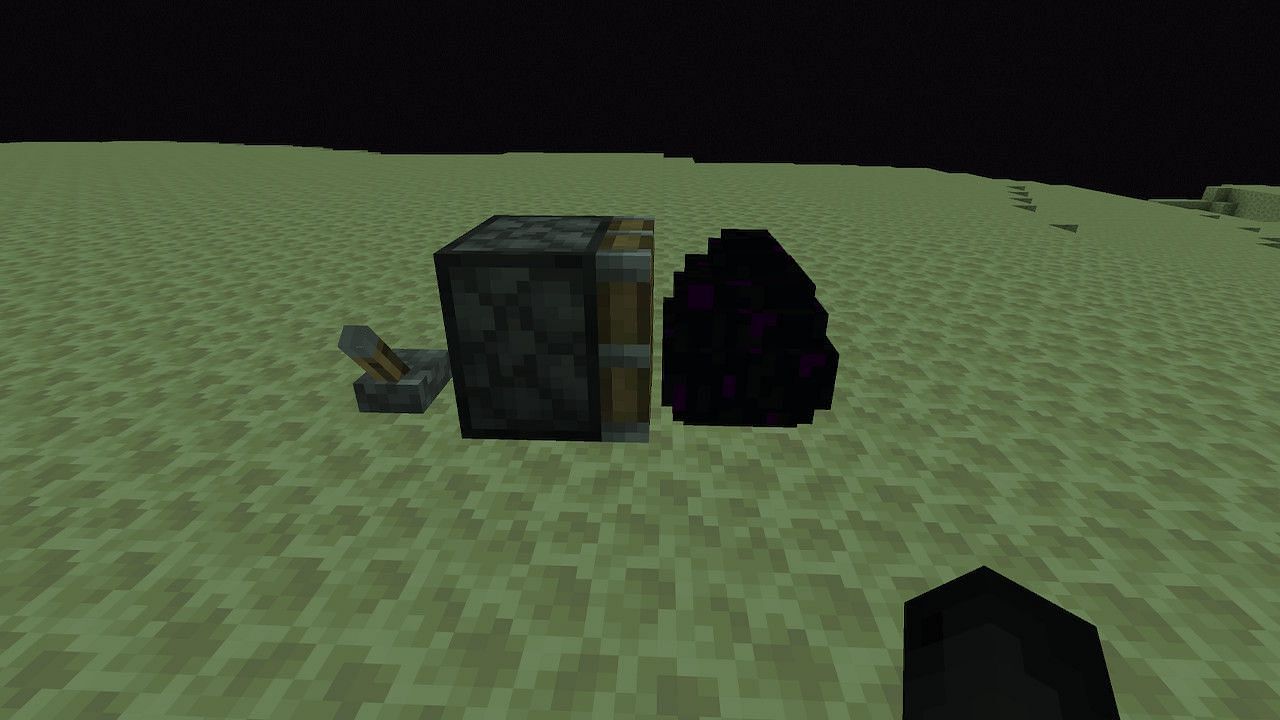 The piston method very quickly and easily breaks the dragon egg in order for players to collect it (Image via Minecraft)