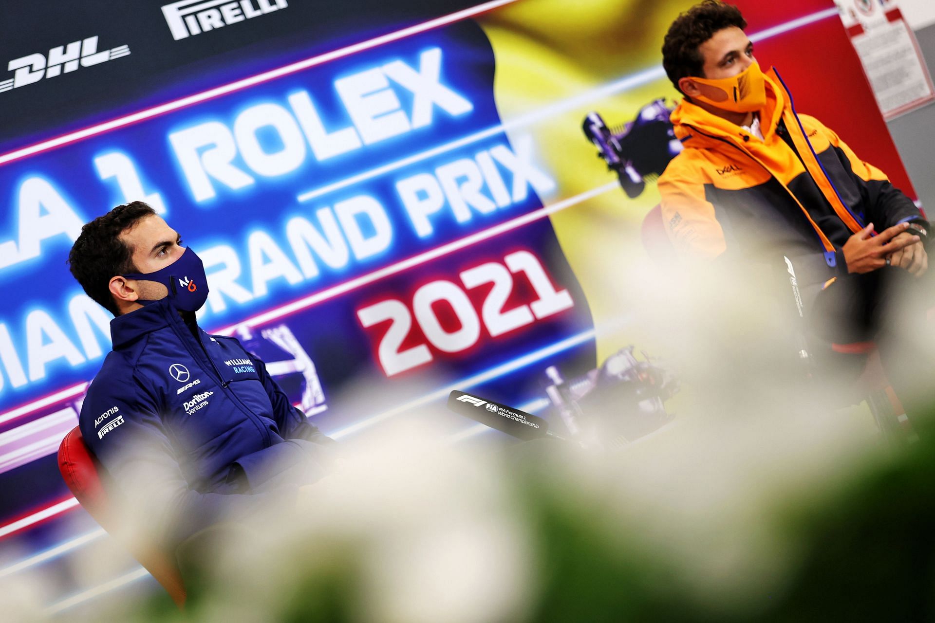 Nicholas Latifi (left) and Lando Norris (right) talk in the Drivers&#039; Press Conference ahead of the 2021 Belgium Grand Prix 2021 (Photo by Laurent Charniaux - Pool/Getty Images)