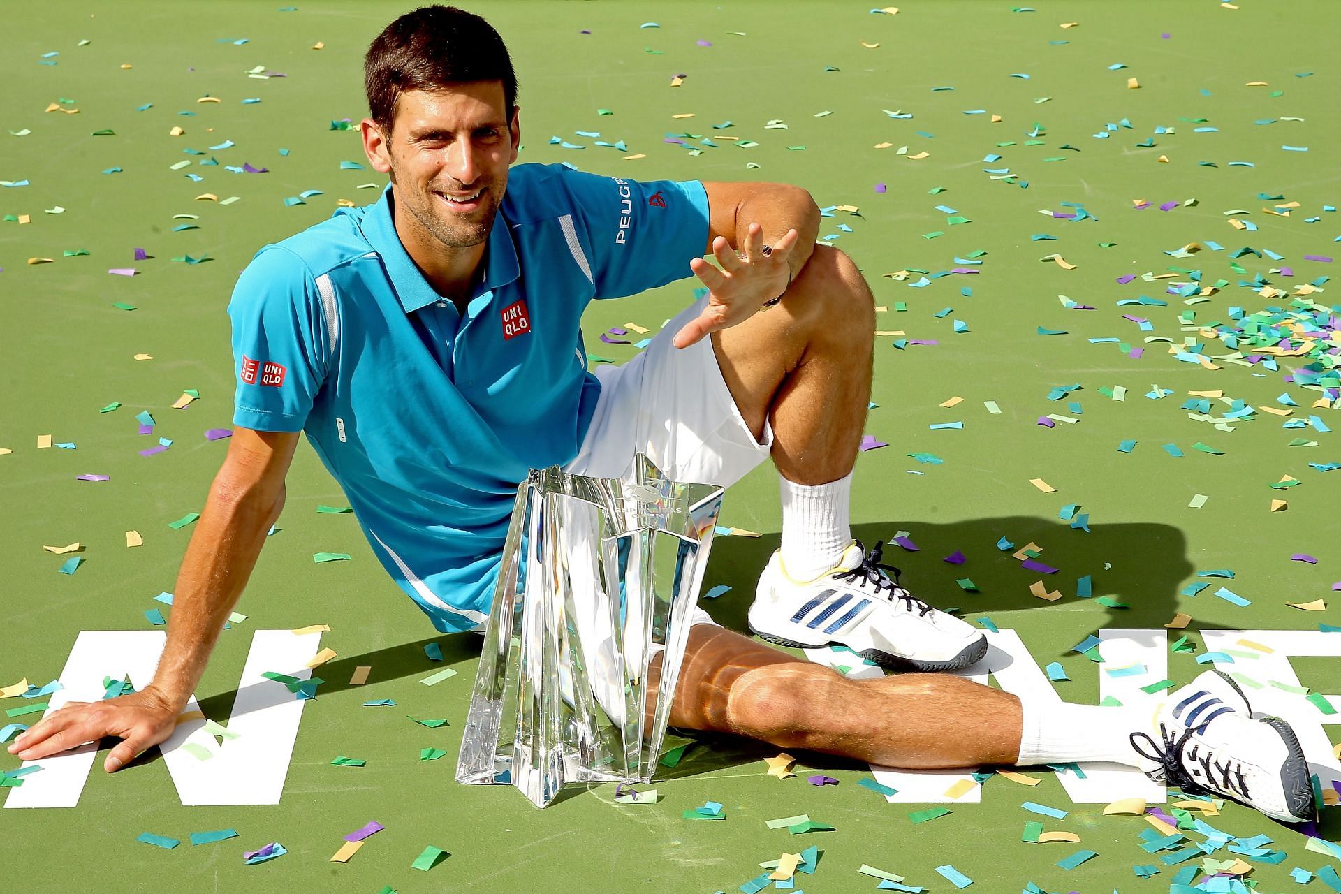 Novak Djokovic celebrates winning his fifth Indian Wells Masters title in 2016