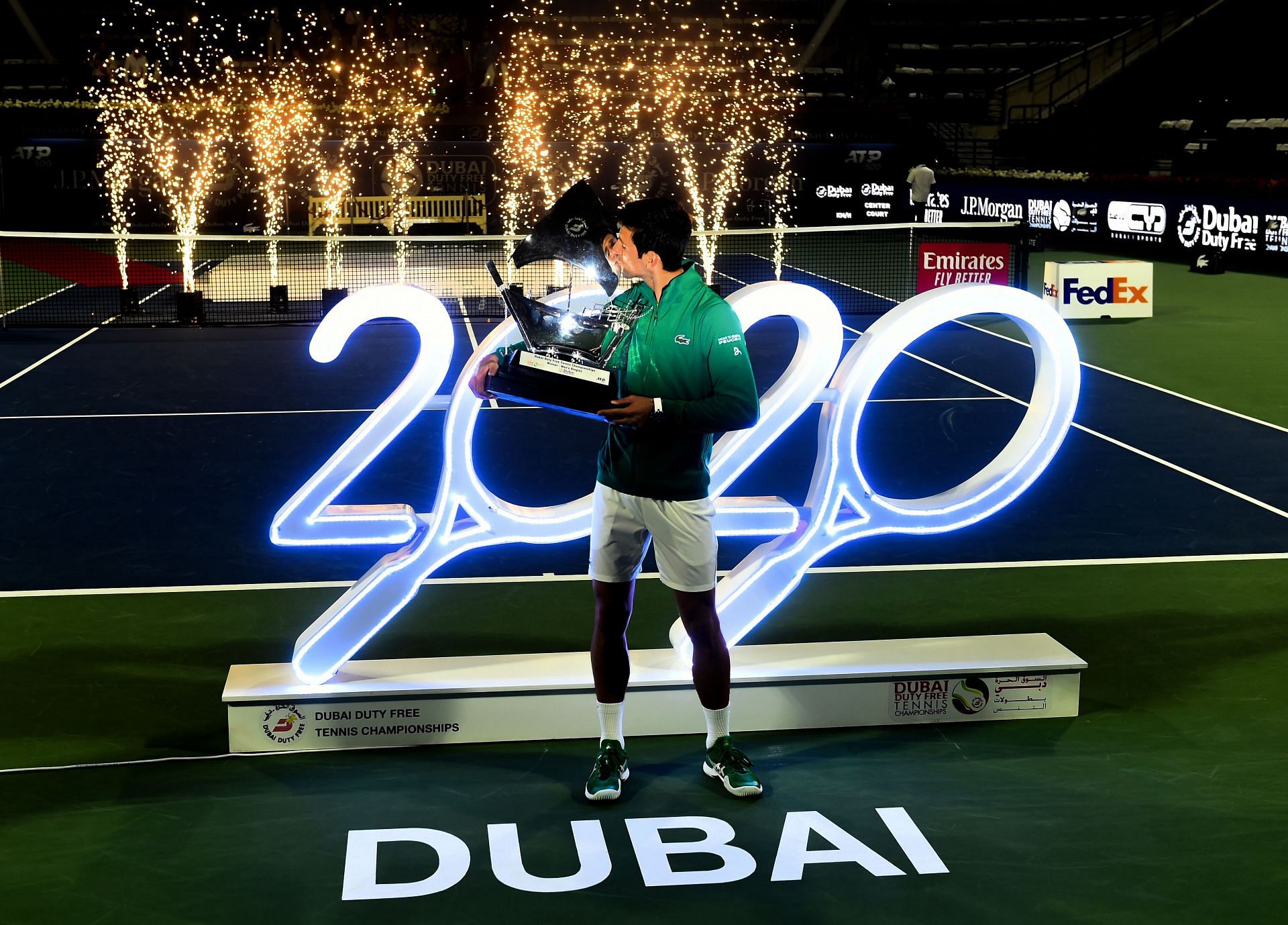 The World No. 1 celebrates with the Dubai Open title in 2020