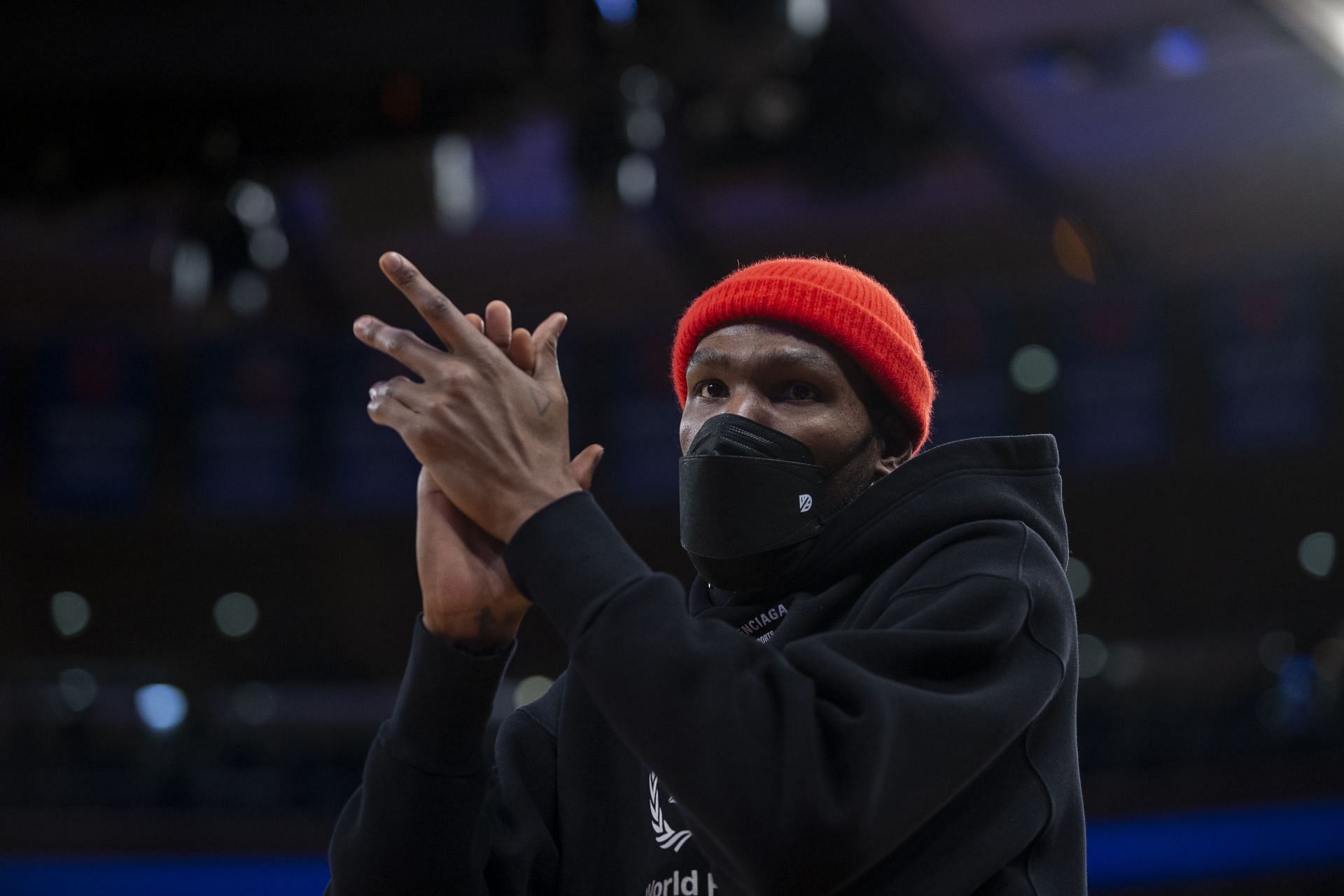 Durant watching his team take on the New York Knicks.