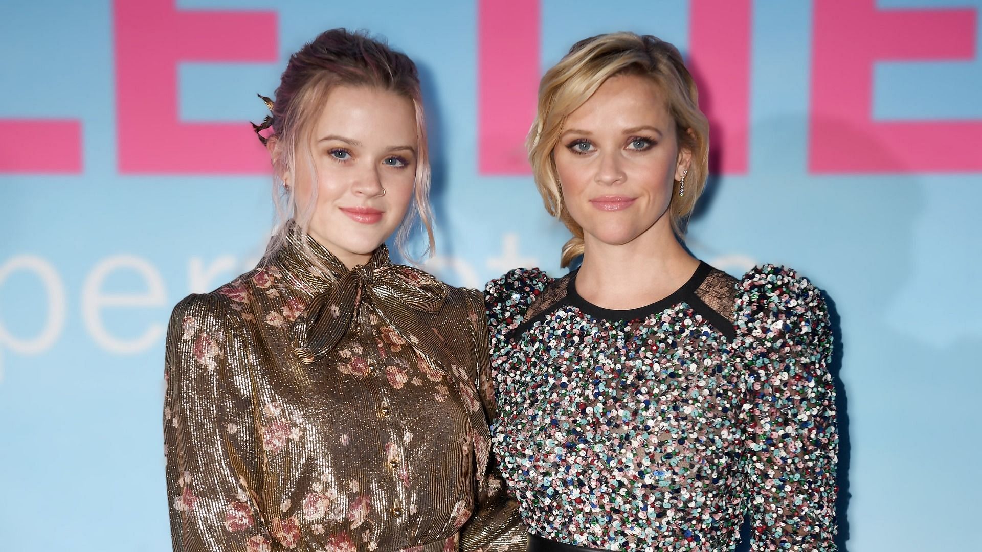 Reese Witherspoon and Ava Phillippe posed for a photograph together as they held their champagne glasses (Image via Getty Images/ Jeff Kravitz)