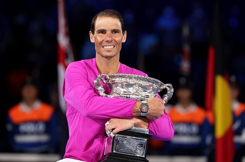 Rafael Nadal poses with the 2022 Australian Open trophy