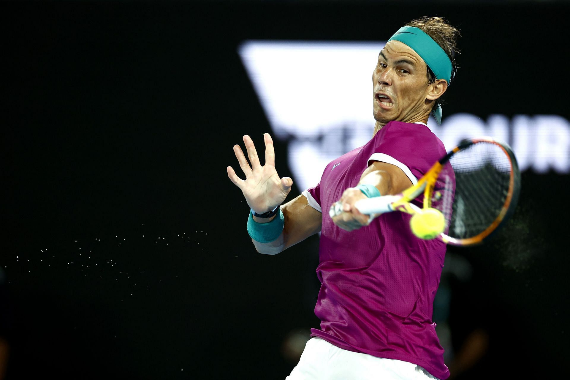 The Spanish bull hits a forehand at the 2022 Australian Open