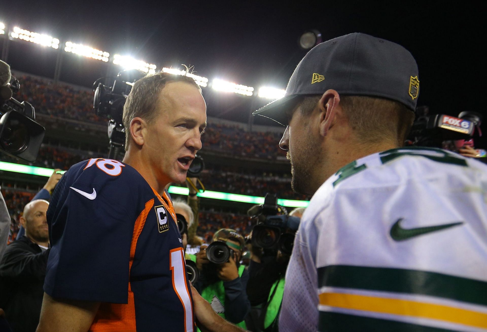 Green Bay Packers QB Rodgers and former Denver Broncos QB Peyton Manning